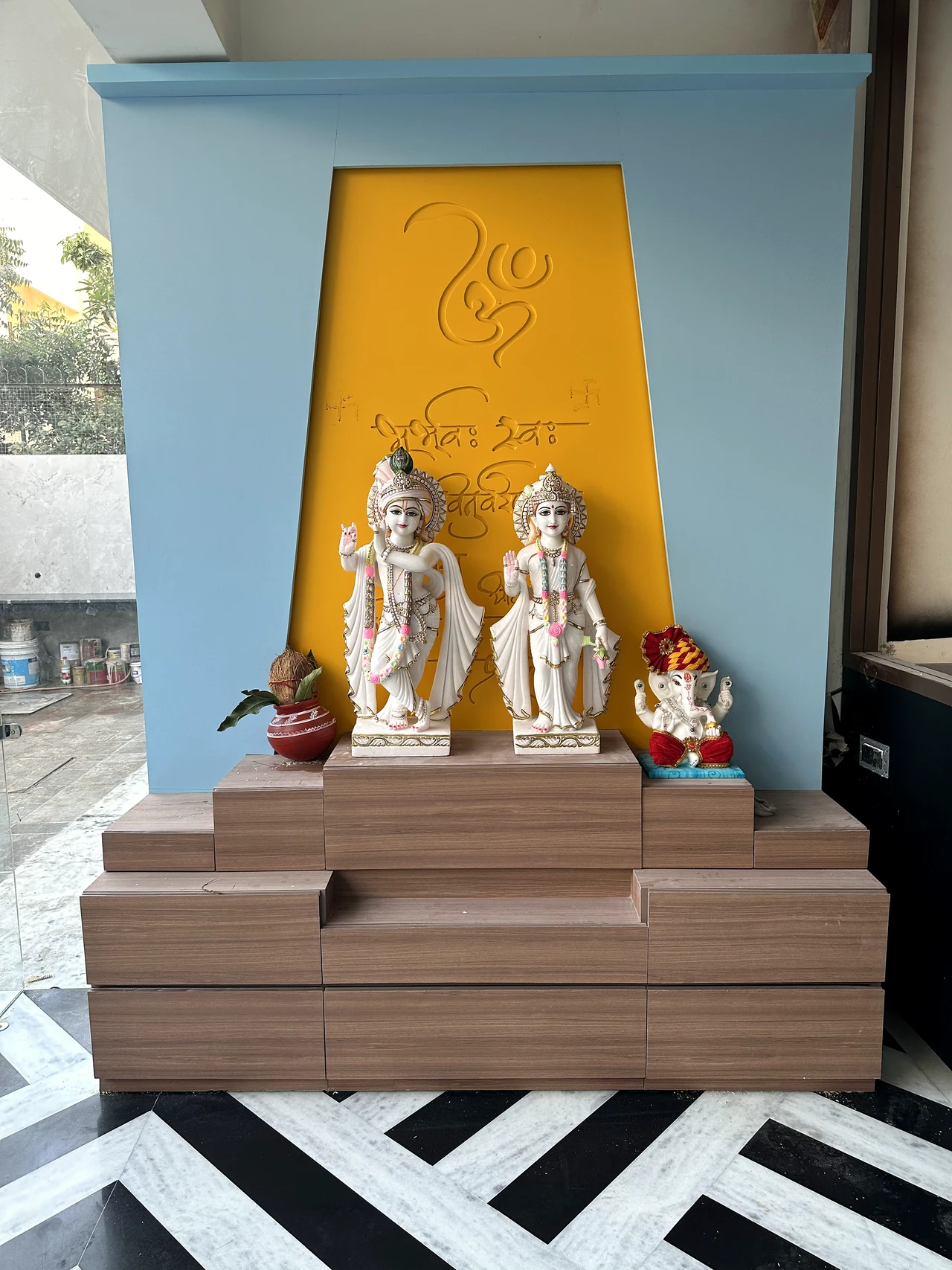 Second view of the puja alcove, console and decorative wall panel